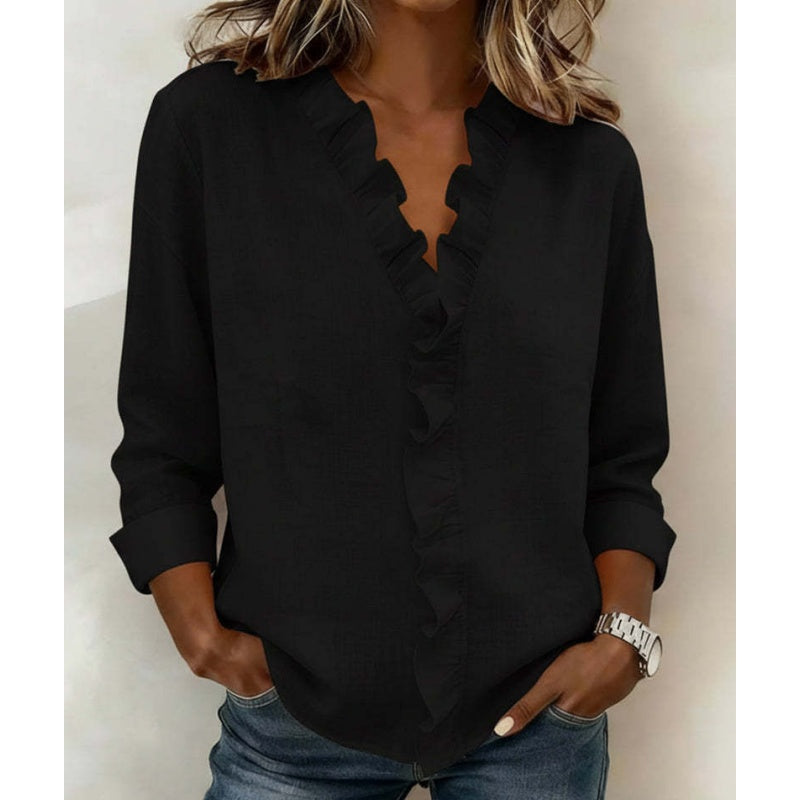 Damesblouse met ruches. V-hals en lange mouwen