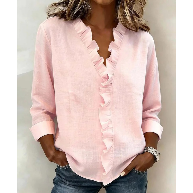 Damesblouse met ruches. V-hals en lange mouwen
