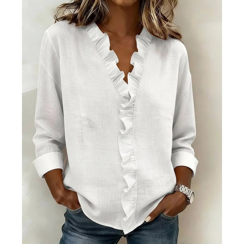 Damesblouse met ruches. V-hals en lange mouwen